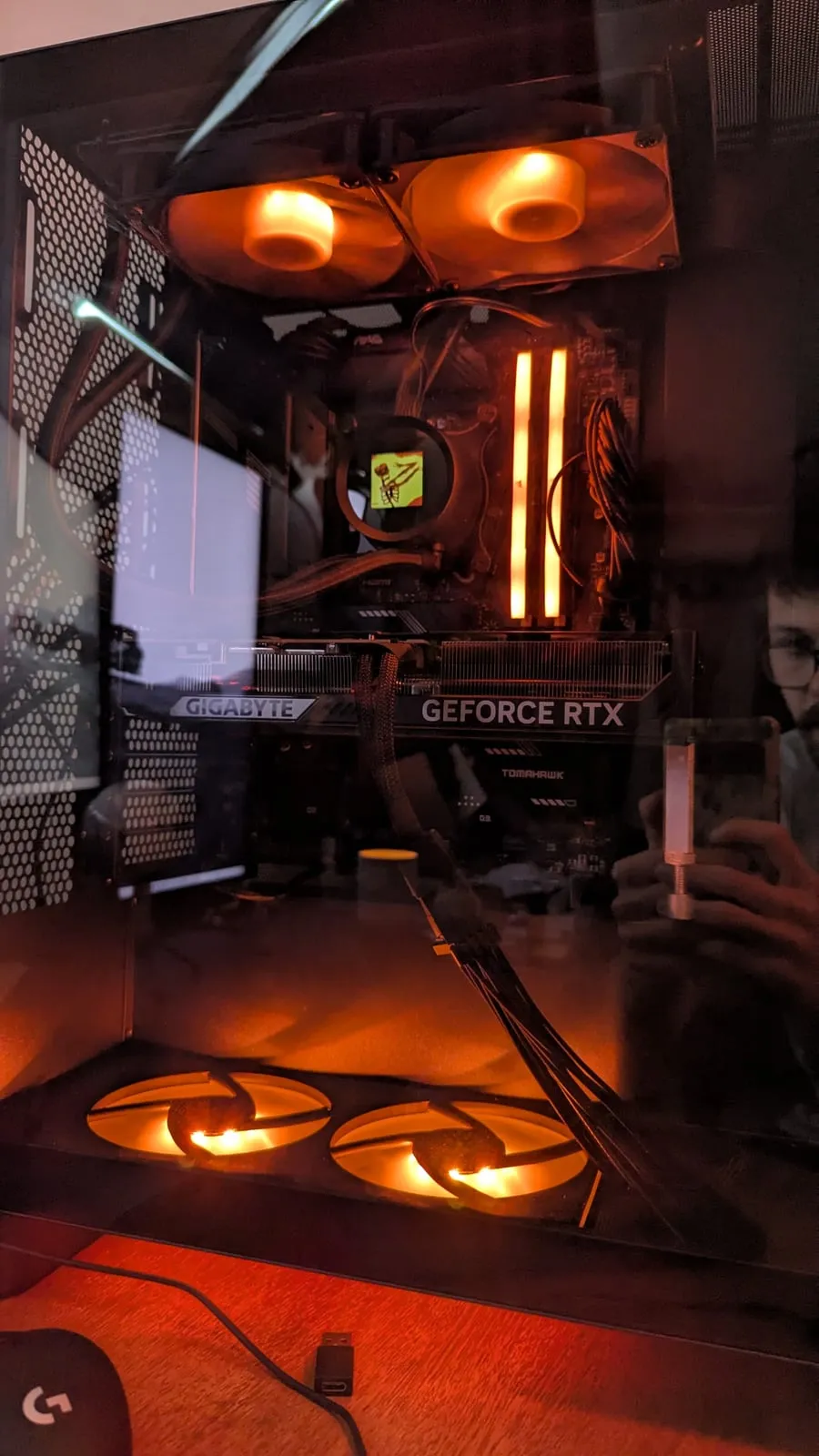 Inside a gaming PC, lit orange