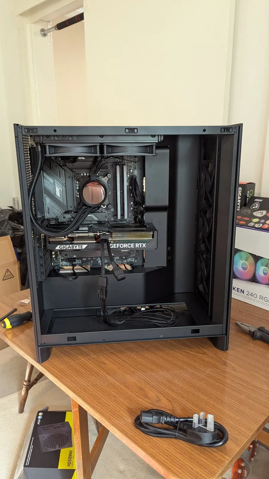 A PC build in progress, the case open